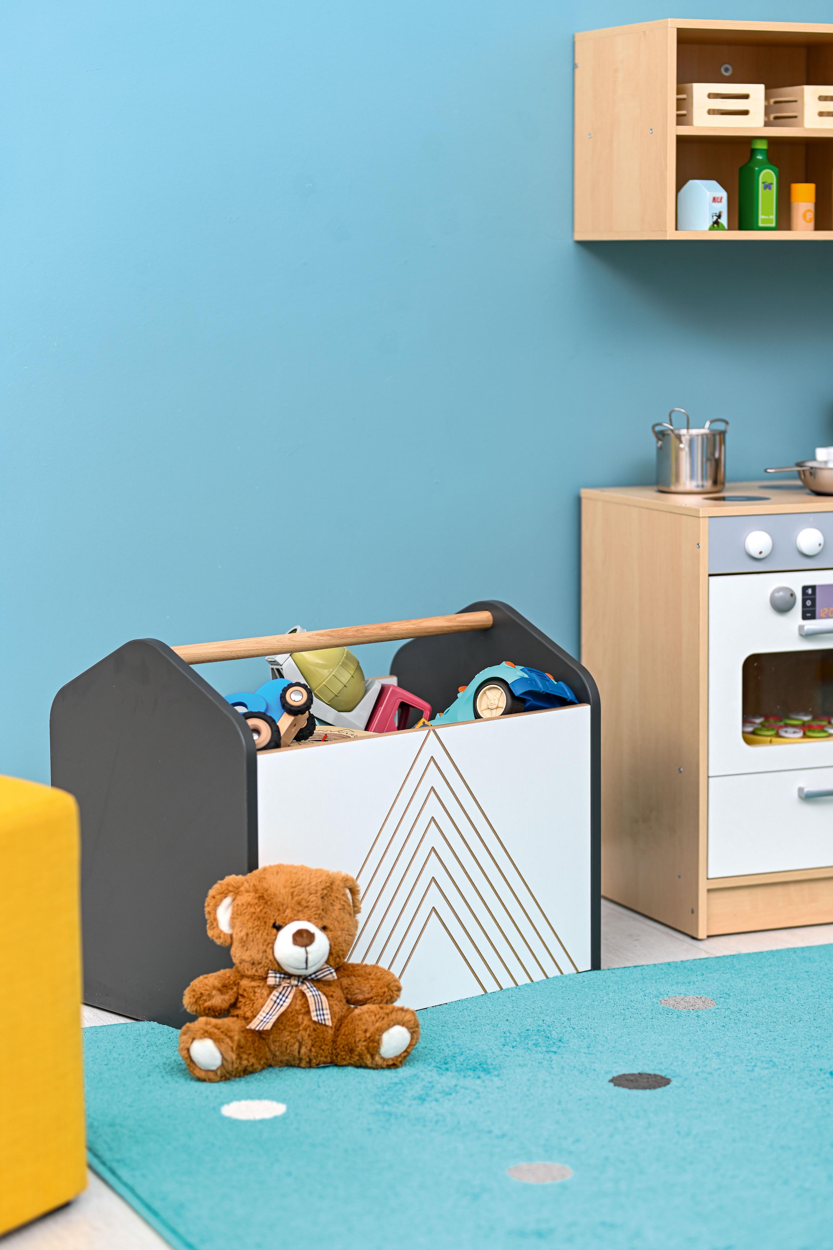 FLO Rollbehälter für Bücher mit Tragegriff – Praktisch & Stilvoll - Produkt wird im Kindergarten oder Schule genutzt.